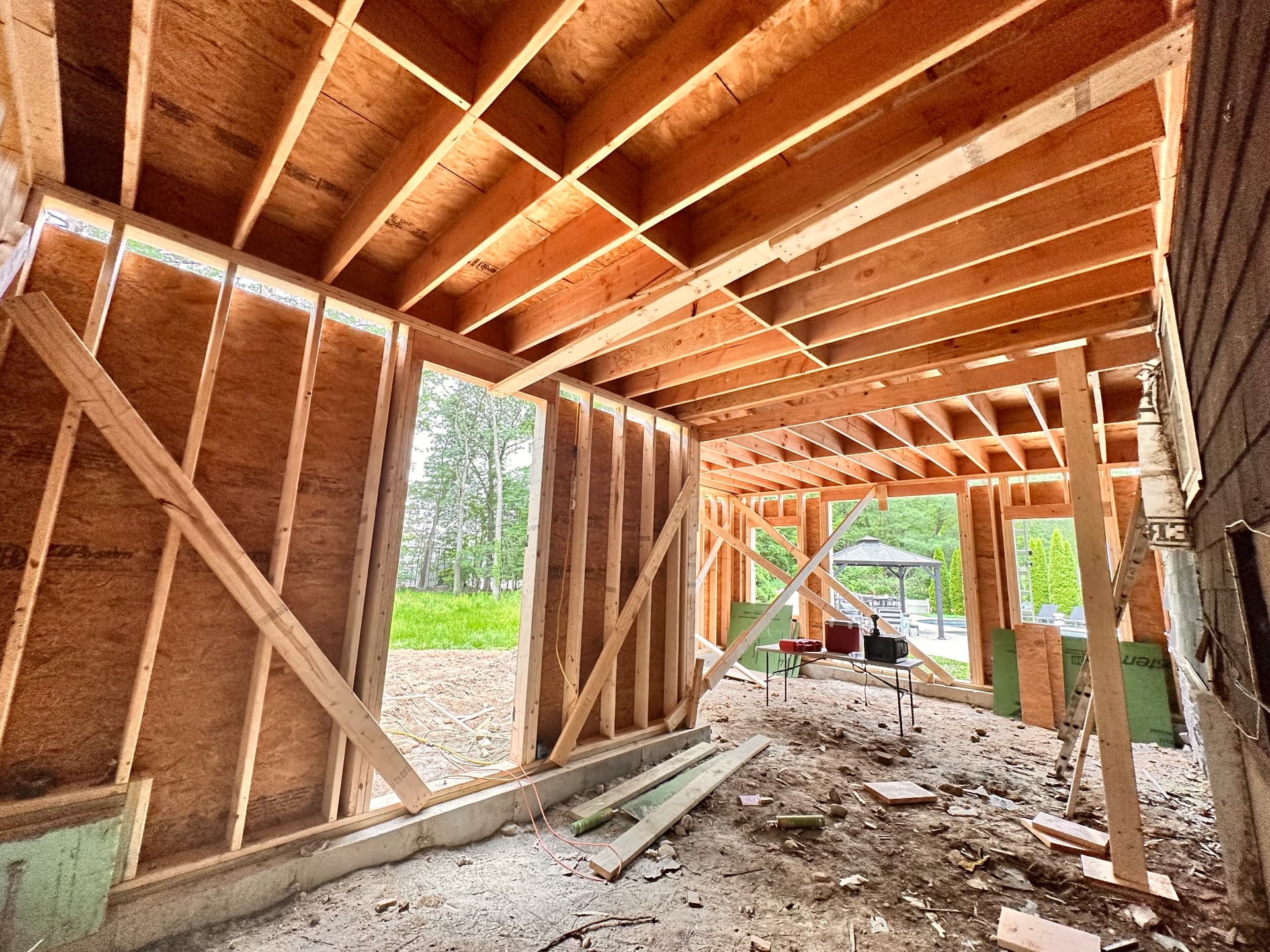 New addition framing with floor joists and window openings