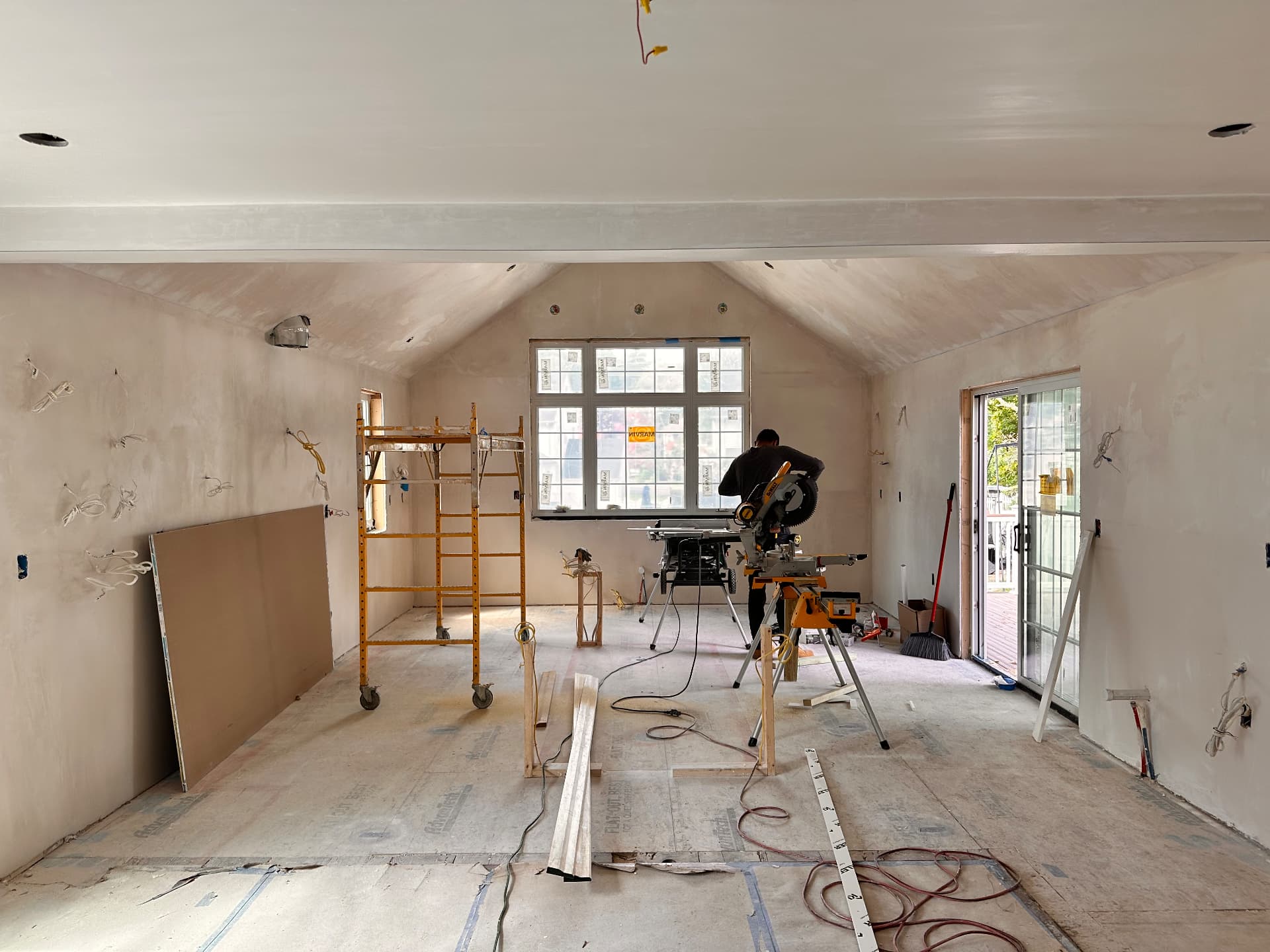 Drywall complete in the vaulted room ahead of trim work