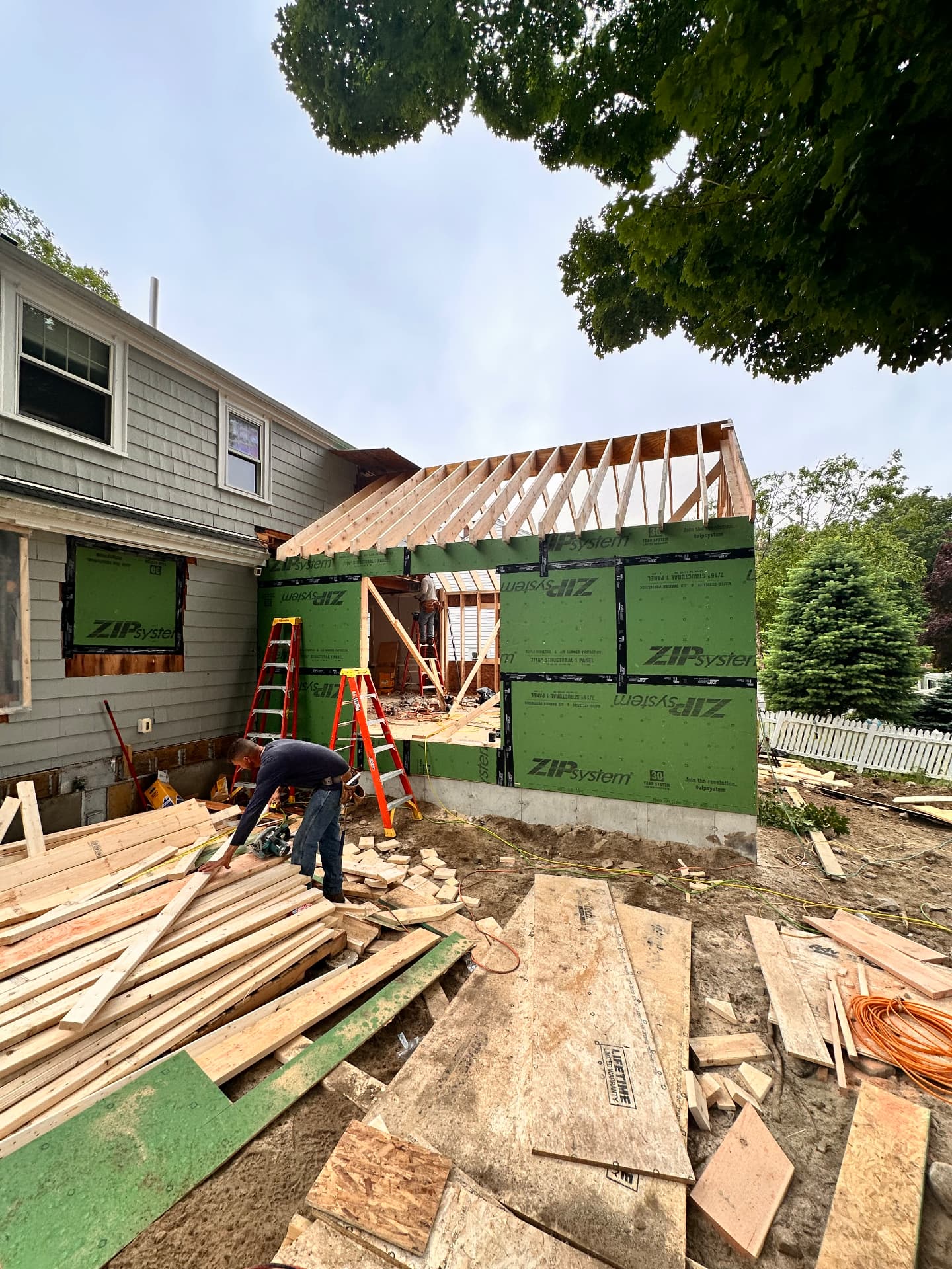 Addition framing with ZIP System sheathing and new roof rafters
