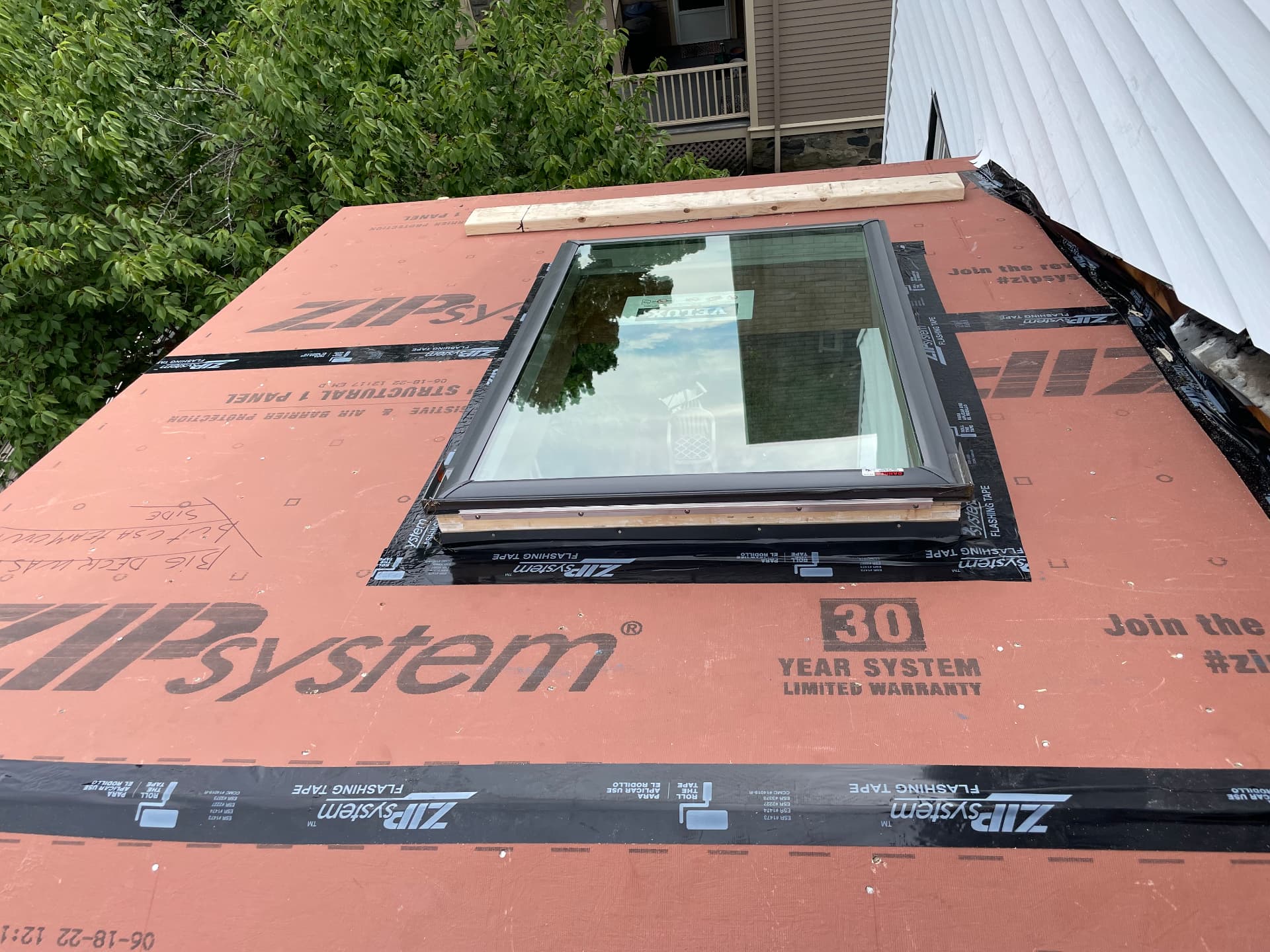 Velux skylight set and flashed into ZIP System roof sheathing